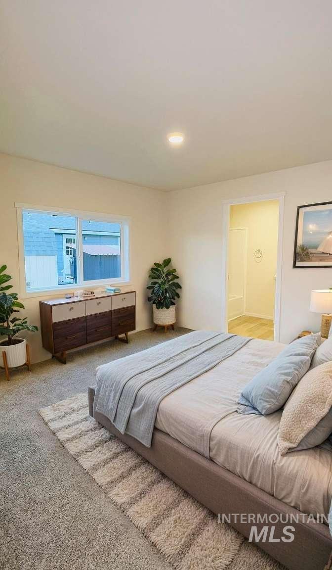 10 Kamloop Lane Orofino, ID 83544 - Photo 5 of 17 Carpeted room with a recessed light fixture and a window
