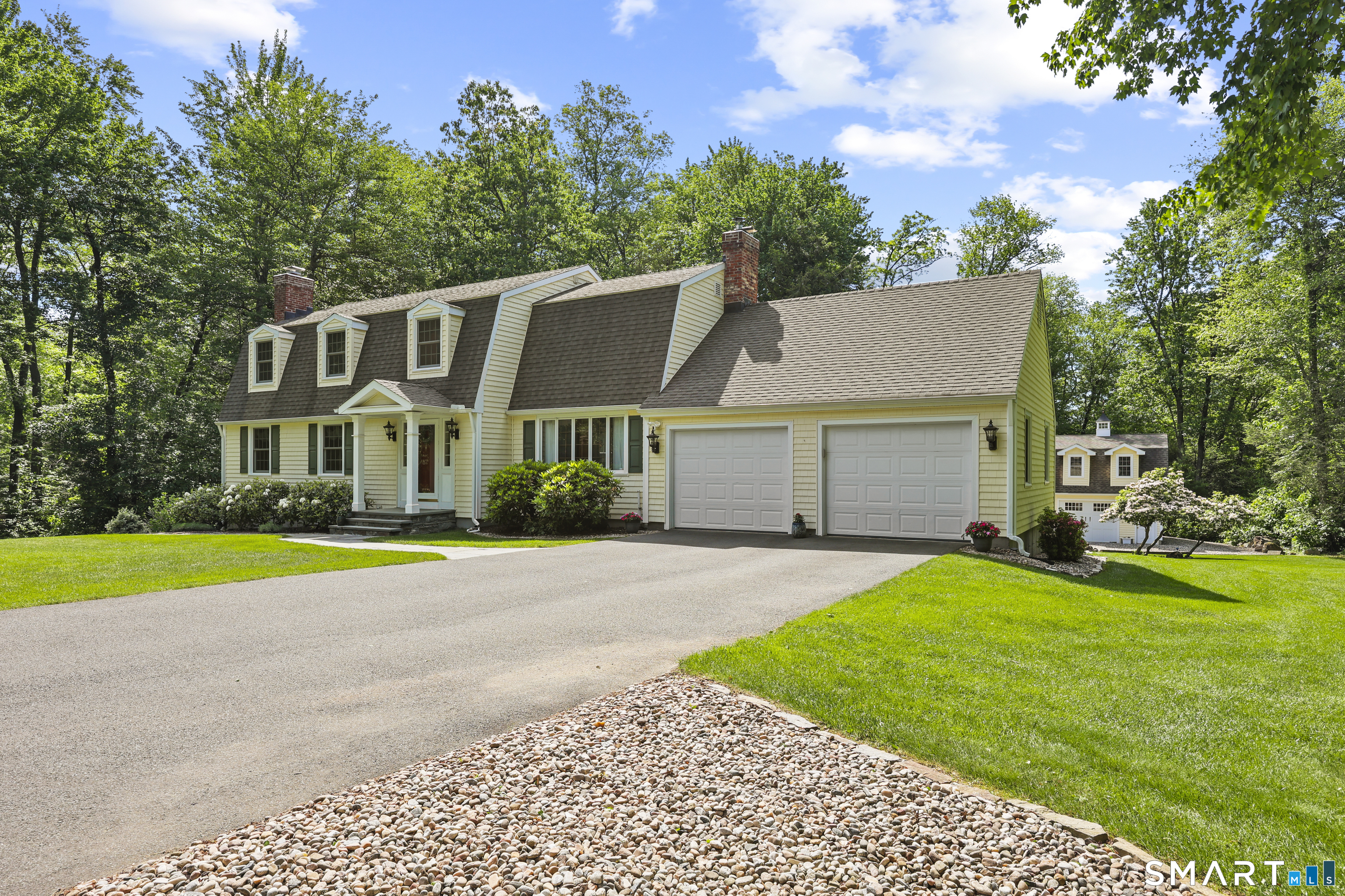 17 Briar Hill Road Avon, CT 06001 - Photo 1 of 38 Curb appeal with this beautiful Dutch Colonial with meticulous lawn & stonework. Carriage house is 20'x30' with a second floor. Both buildings feature matching siding, complimentary architectural styling, creating a cohesive and attractive appearance