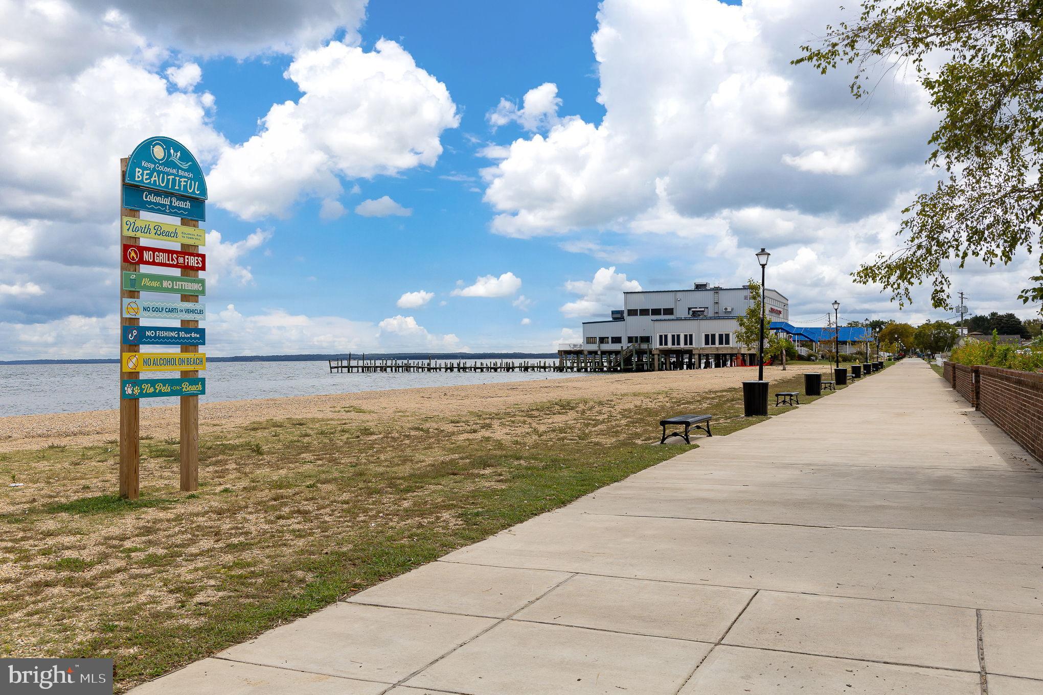 312 9th Street Colonial Beach, VA 22443 - Photo 35 of 62 Scenic waterfront with vibrant skies.