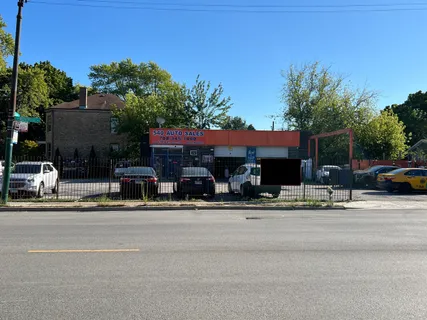 a view of street with parked cars