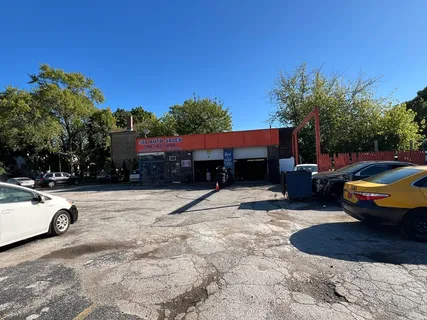 a cars parked in the middle of a yard