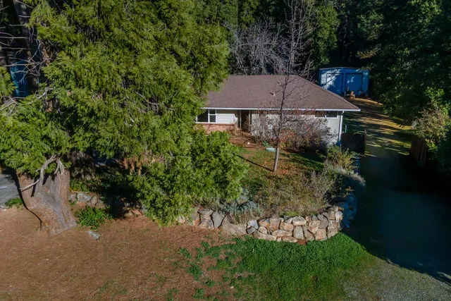 a view of a house with garden