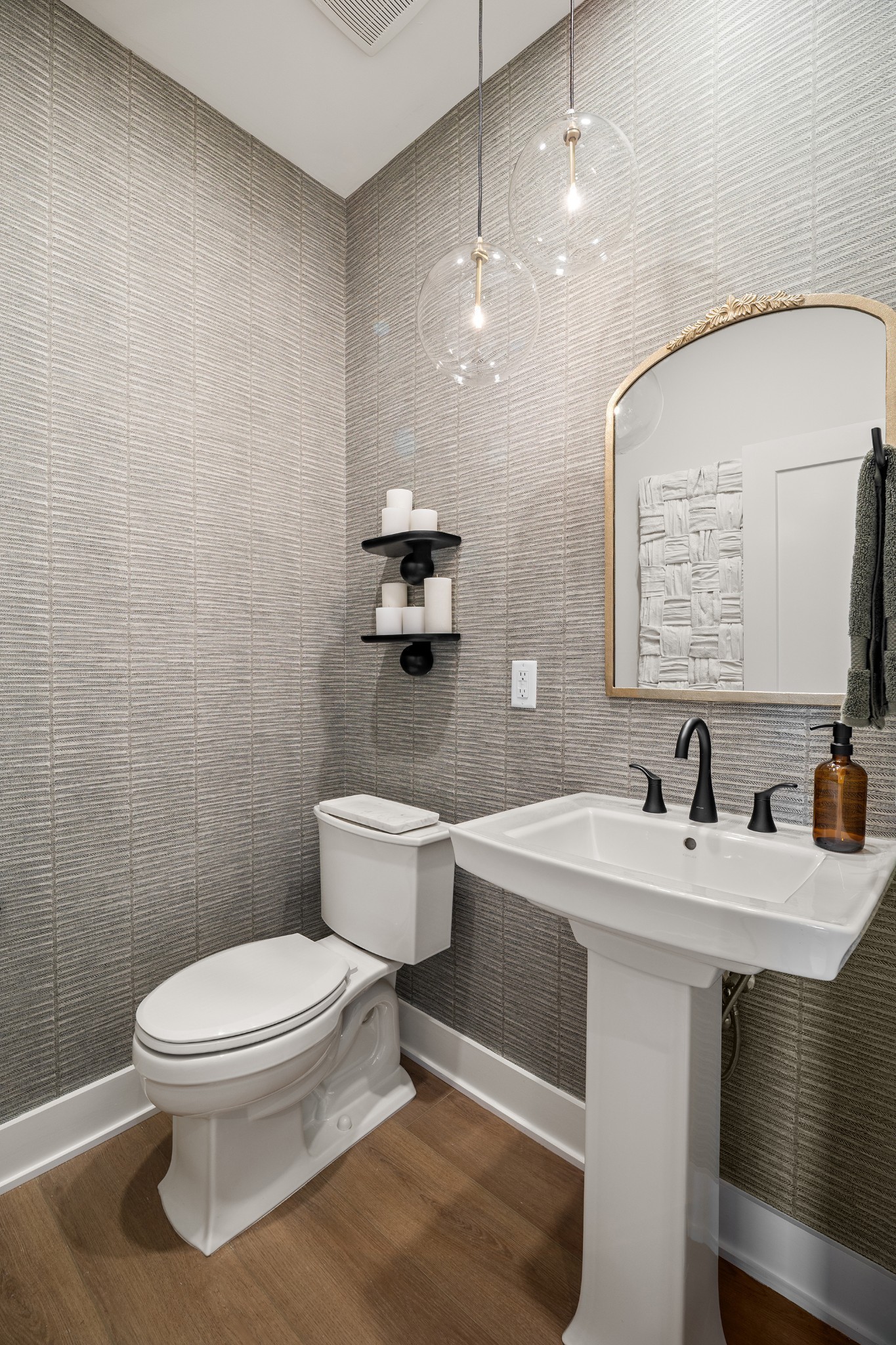 2615 Wilkinson Pike, Unit 1306 Murfreesboro, TN 37129 - Photo 7 of 45 a bathroom with a toilet a sink and mirror