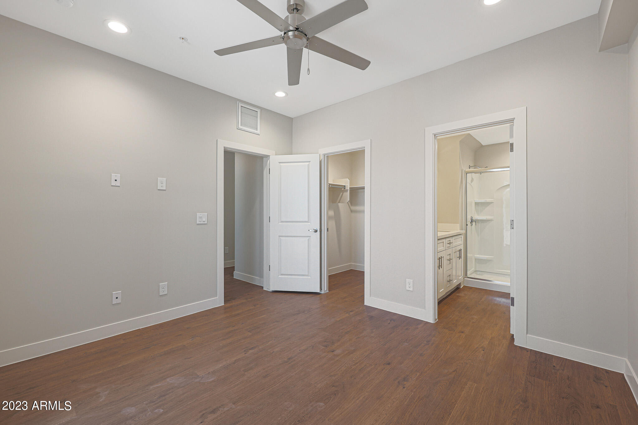 6060 East Baseline Road, Unit 151 Mesa, AZ 85206 - Photo 17 of 45 wooden floor in an empty room with a window
