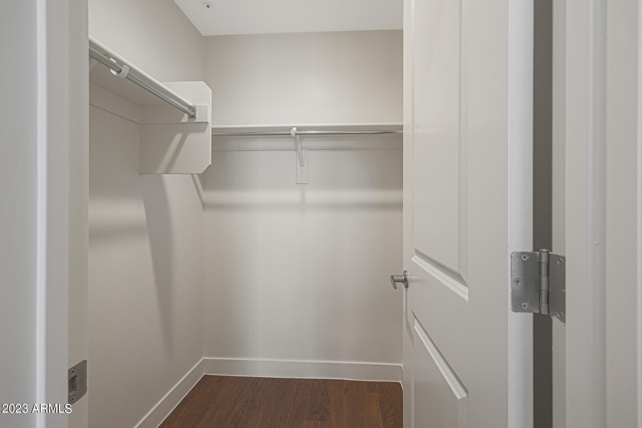 6060 East Baseline Road, Unit 151 Mesa, AZ 85206 - Photo 19 of 45 a view of walk in closet with empty racks