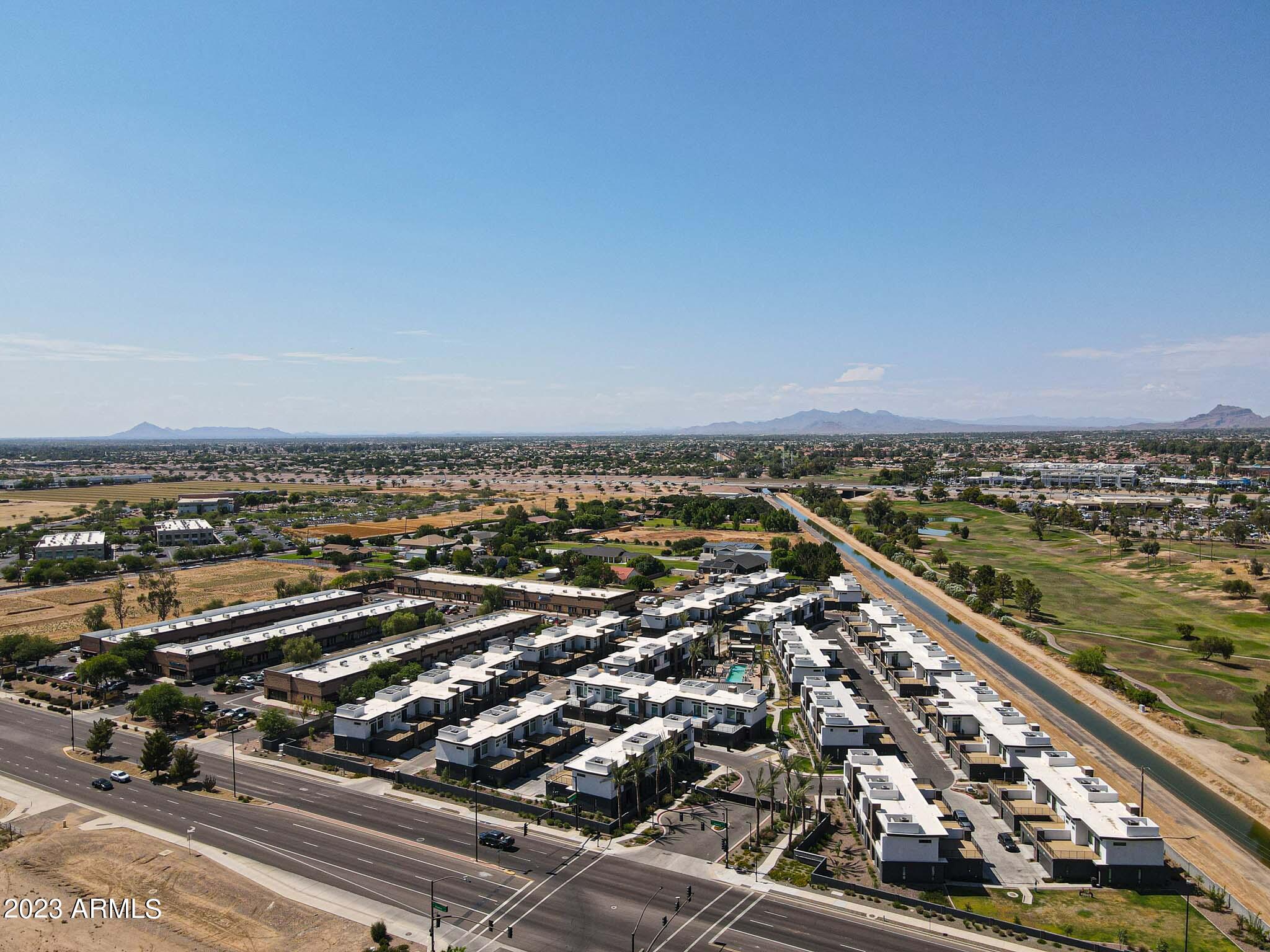 6060 East Baseline Road, Unit 151 Mesa, AZ 85206 - Photo 38 of 45 an aerial view of residential building and ocean view