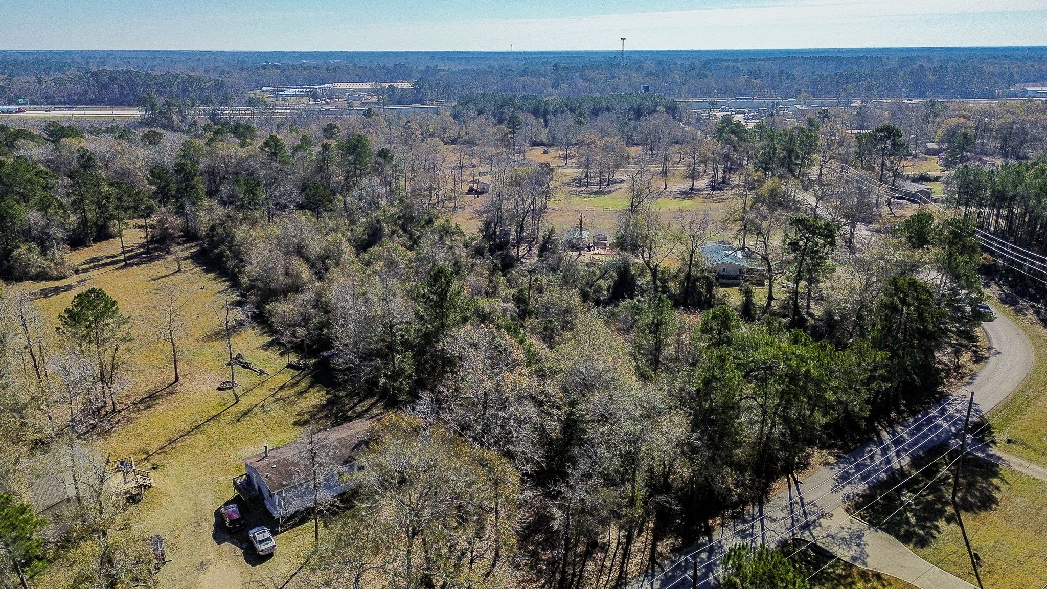 378 County Road 381 Cleveland, TX 77328 - Photo 5 of 15 a view of a city and mountain view
