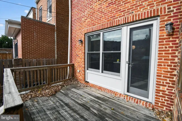 a view of a balcony with a window