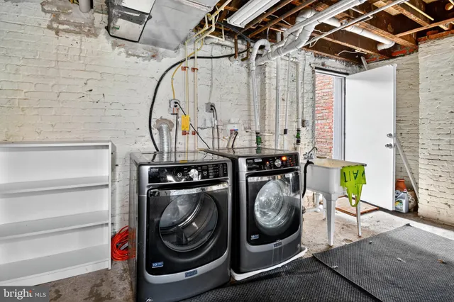 a utility room with dryer and washer