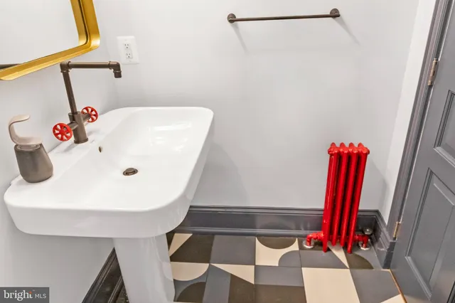 a bathroom with a bathtub and shower