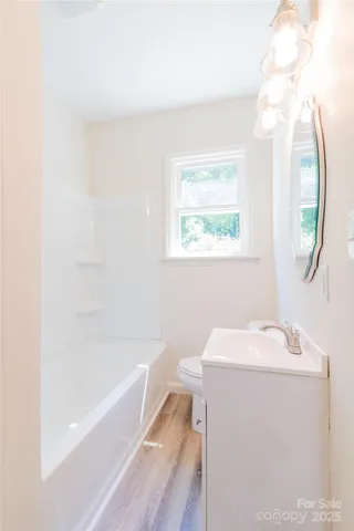 a bathroom with a sink and a bathtub