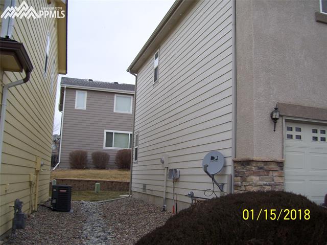 4670 Fish Hawk Point Colorado Springs, CO 80922 - Photo 16 of 16 Side view.