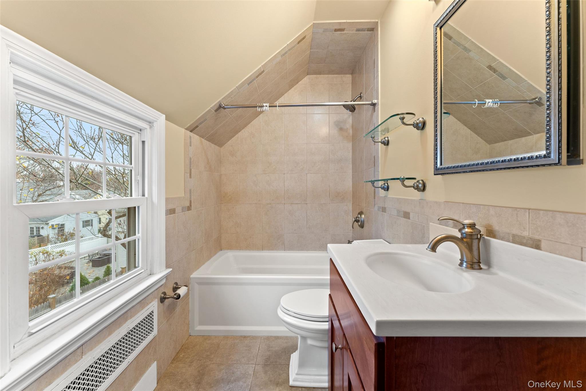 1 Winslow Circle Tuckahoe, NY 10707 - Photo 21 of 30 a bathroom with a sink a toilet and shower
