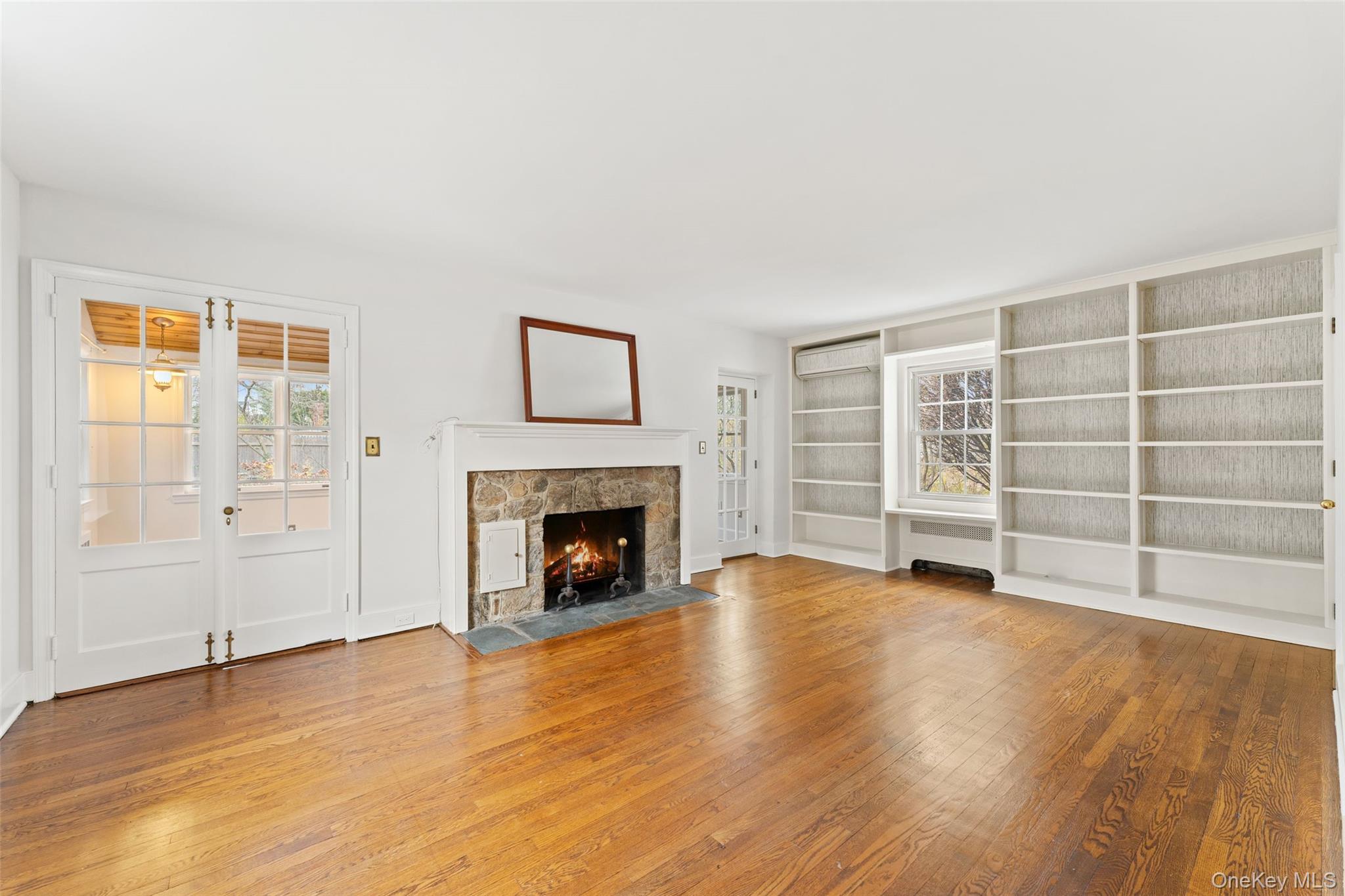 1 Winslow Circle Tuckahoe, NY 10707 - Photo 4 of 30 a view of an empty room with wooden floor and a window