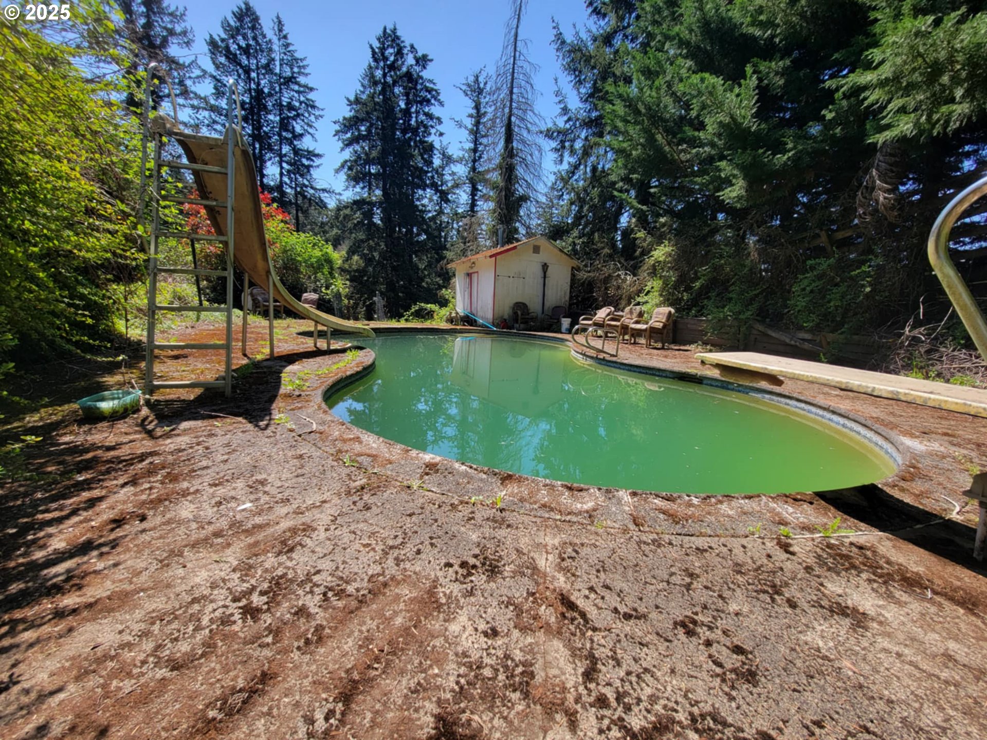 4295 Southwest Homesteader Road Wilsonville, OR 97070 - Photo 19 of 27 a view of a house with a yard and sitting area