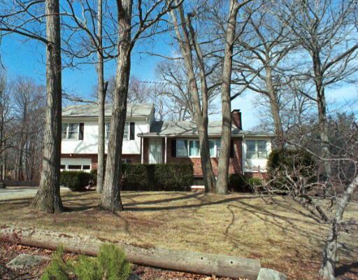 159 Crystal Lake Road Stamford, CT 06905 - Photo 1 of 1 a view of a house with snow on the road