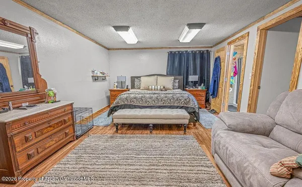 a bed room with a bed and a couch