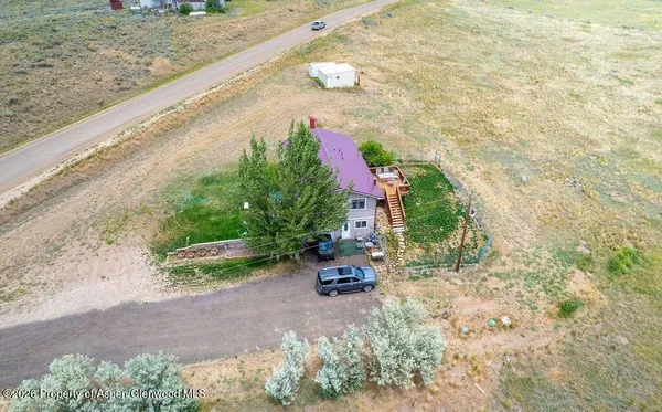 a view of garden with patio