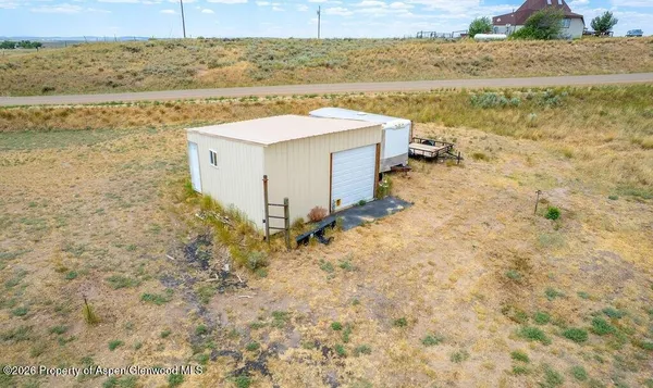 a bathroom with a sink and a lake view