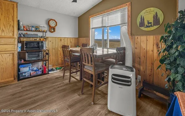 a view of a kitchen and dining room