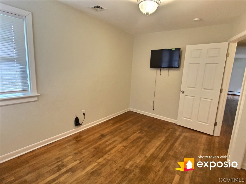 3625 Snyder Road Richmond, VA 23235 - Photo 23 of 27 Bedroom with hardwood floors, and overhead lights.