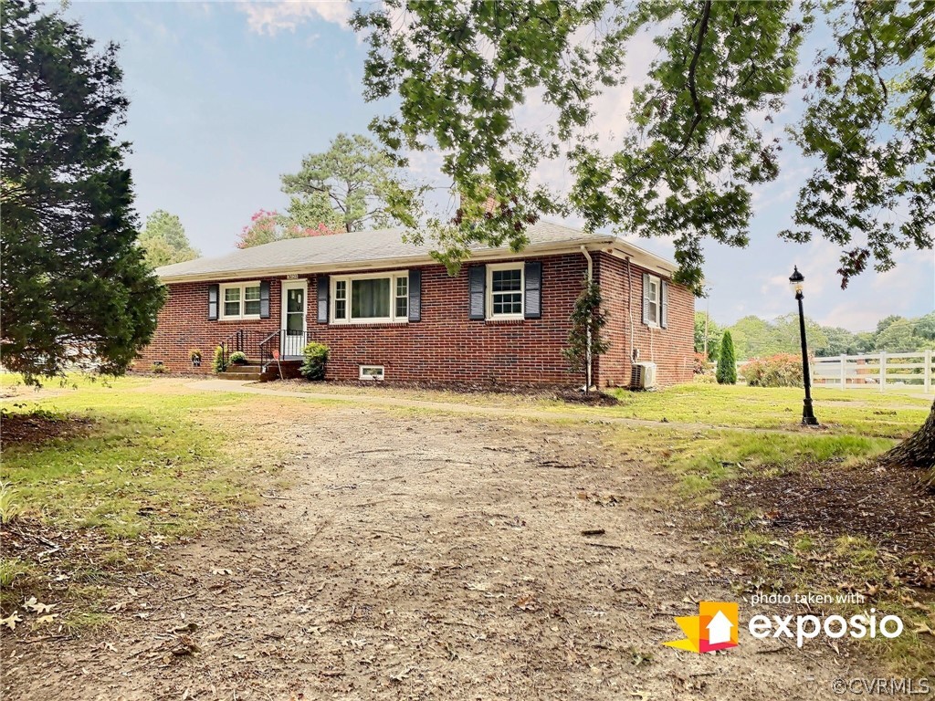 3625 Snyder Road Richmond, VA 23235 - Photo 4 of 27 Right side of house showing driveway and additiona