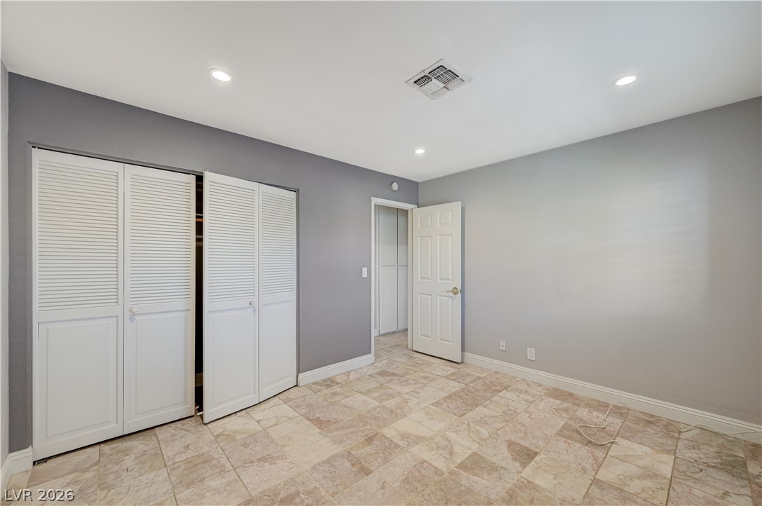 6635 Costa Brava Road Las Vegas, NV 89146 - Photo 44 of 59 Recessed lighting illuminates this room with tile flooring and ample storage.