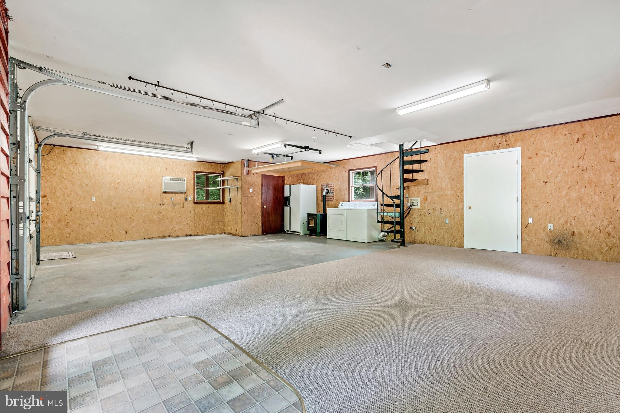 11320 Drogheda Mountain Road Rixeyville, VA 22737 - Photo 17 of 29 a view of empty room with wooden floor