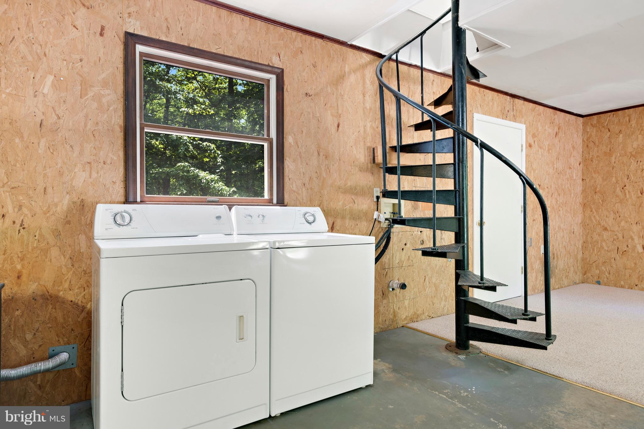 11320 Drogheda Mountain Road Rixeyville, VA 22737 - Photo 21 of 29 a utility room with dryer and washer