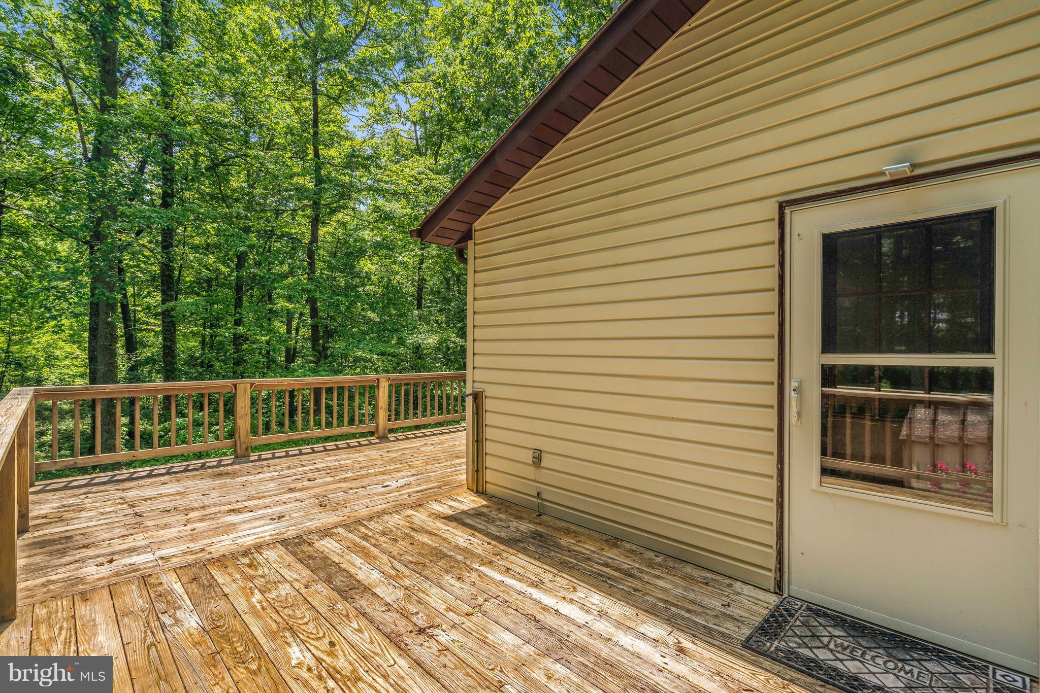 11320 Drogheda Mountain Road Rixeyville, VA 22737 - Photo 24 of 29 a view of a wooden balcony