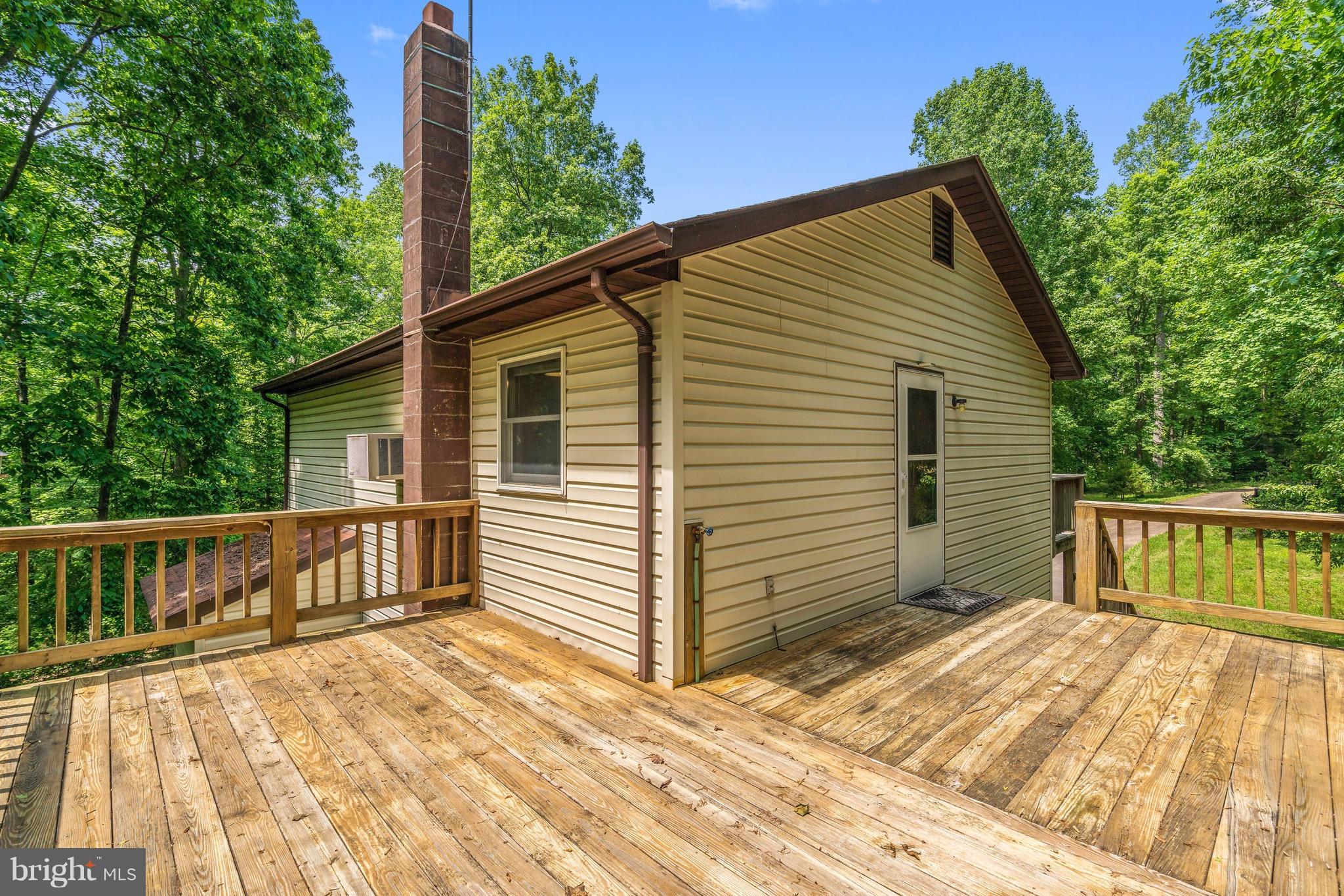 11320 Drogheda Mountain Road Rixeyville, VA 22737 - Photo 25 of 29 a view of a house with a balcony