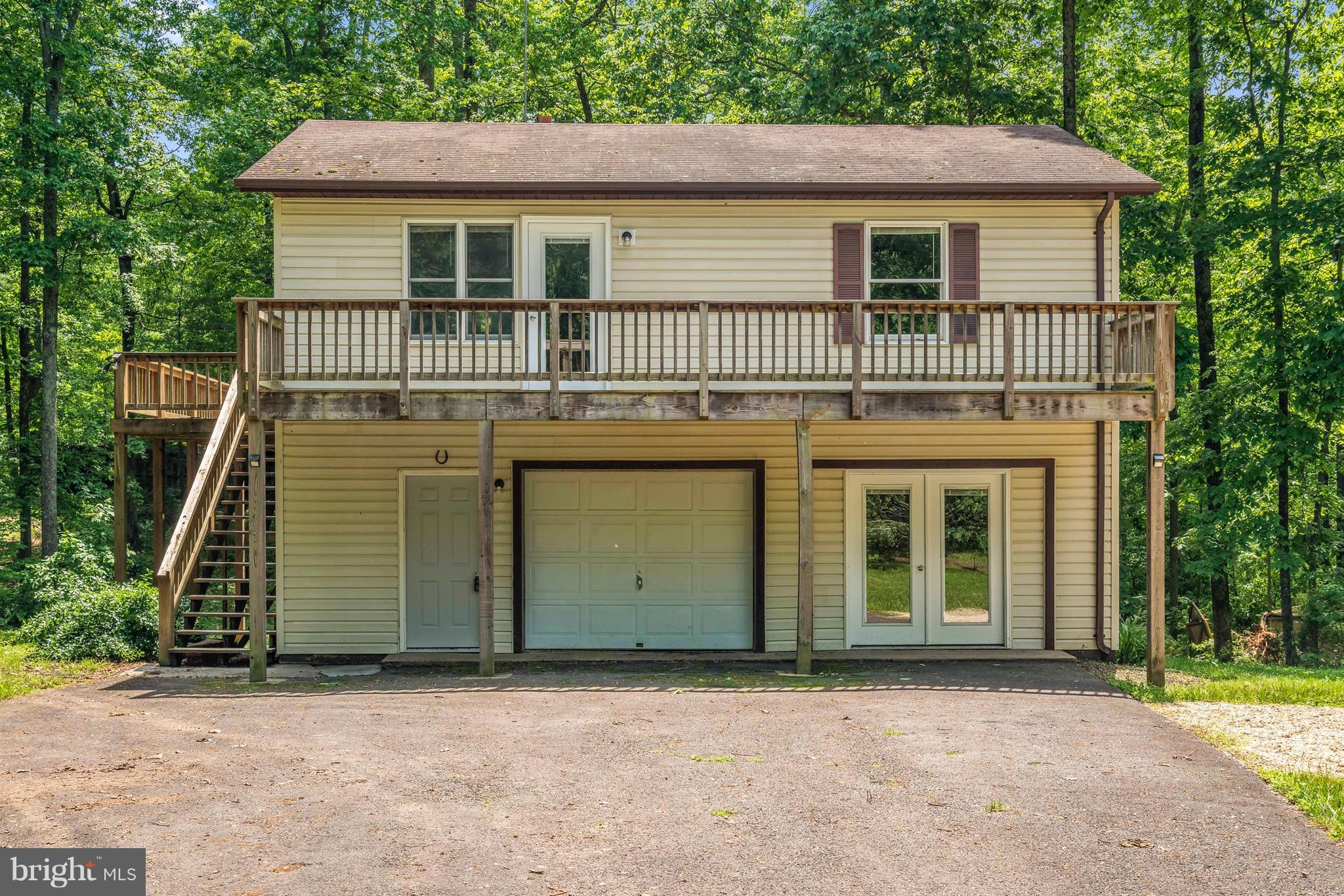 11320 Drogheda Mountain Road Rixeyville, VA 22737 - Photo 27 of 29 a front view of a house with a garden