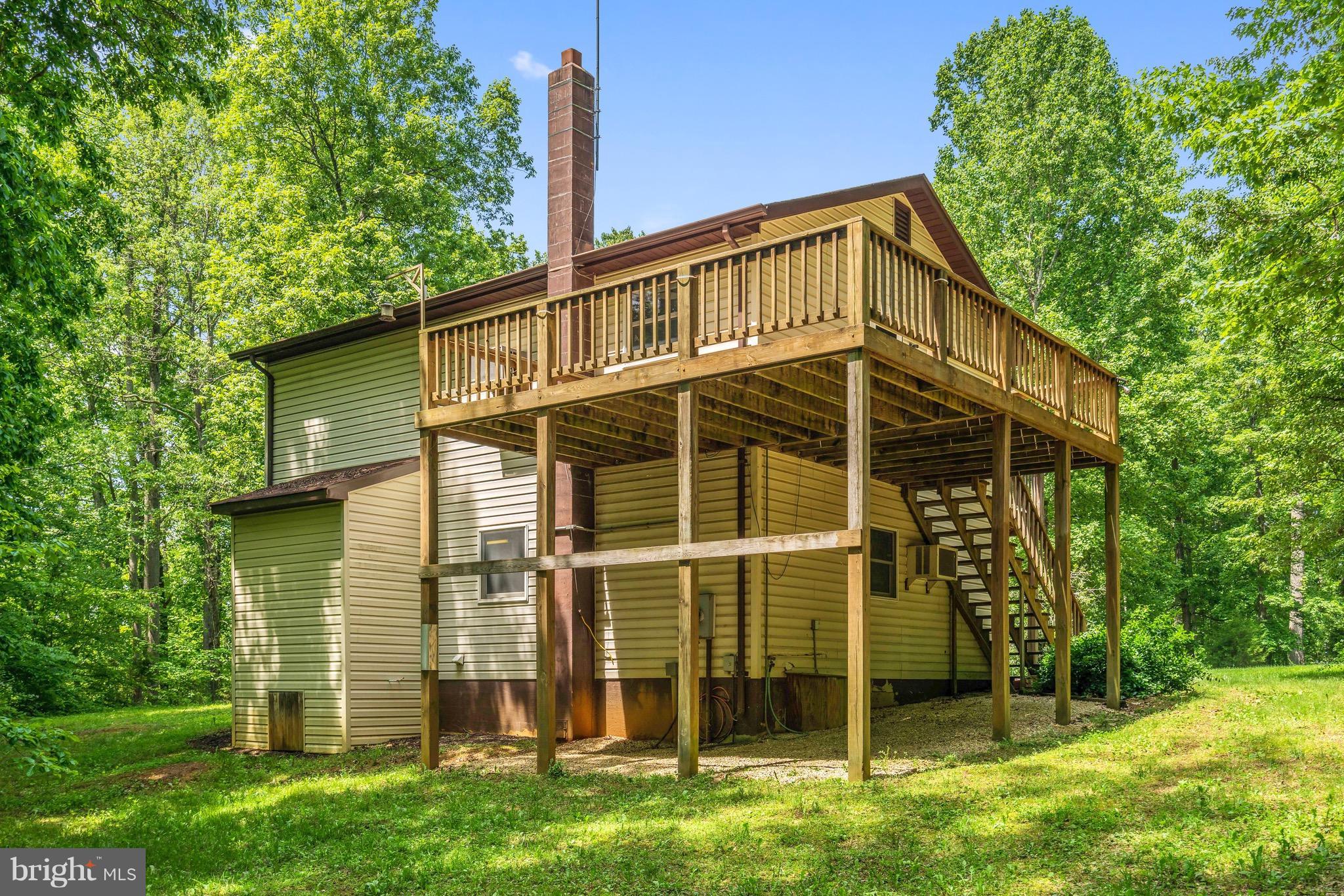 11320 Drogheda Mountain Road Rixeyville, VA 22737 - Photo 29 of 29 a view of a house with a backyard