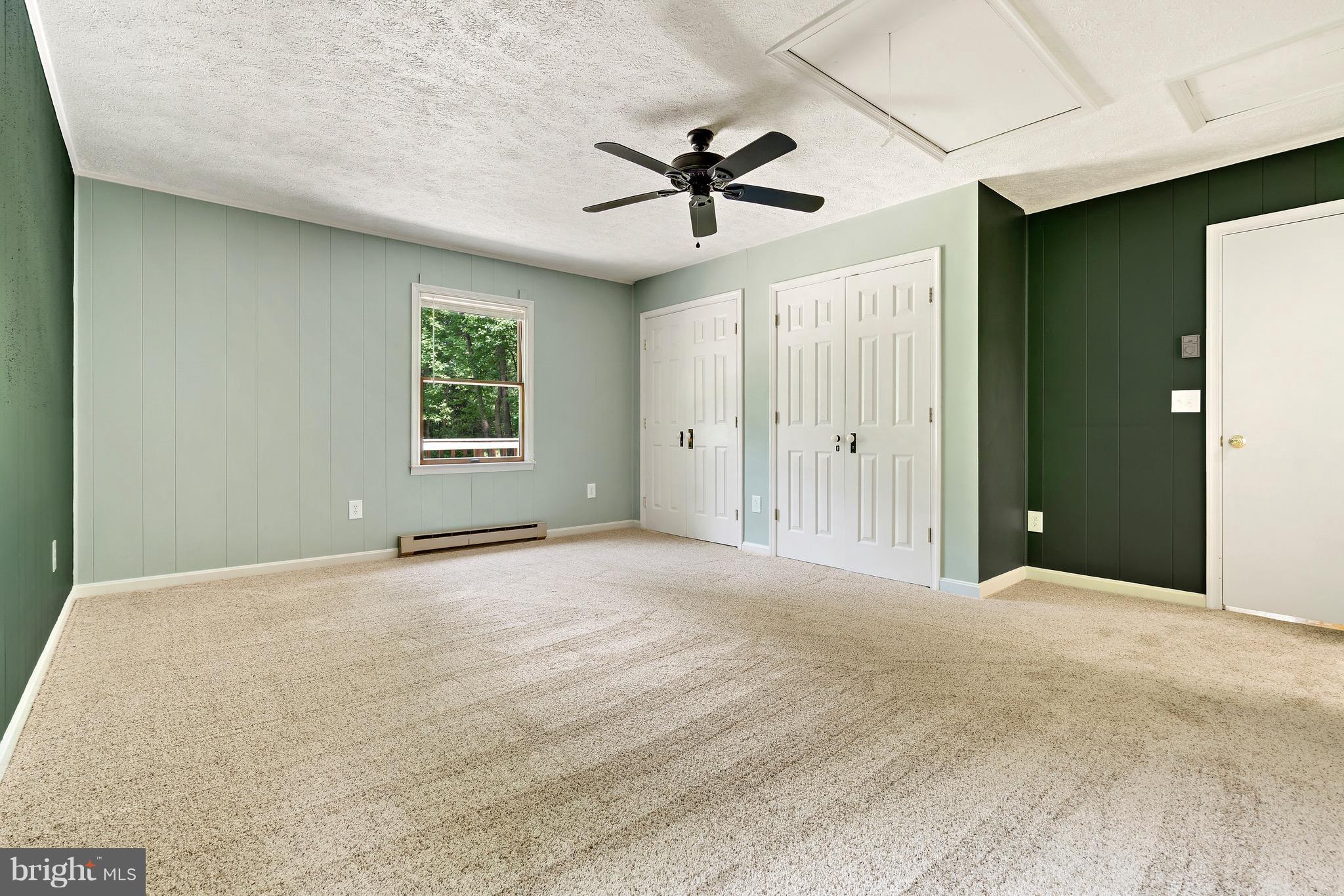 11320 Drogheda Mountain Road Rixeyville, VA 22737 - Photo 5 of 29 a view of an empty room with a window