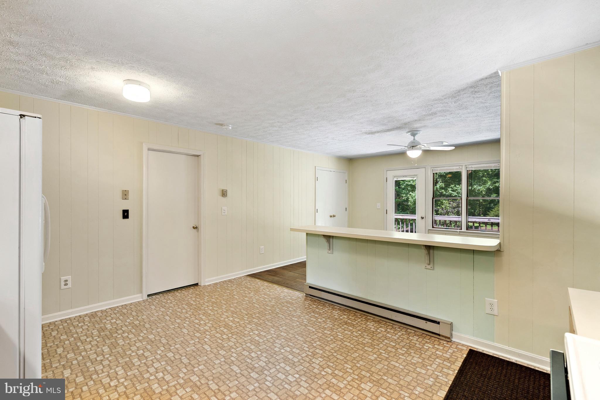 11320 Drogheda Mountain Road Rixeyville, VA 22737 - Photo 6 of 29 a view of an empty room with a window