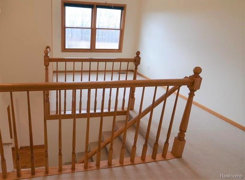 2312 Musson Road Howell, MI 48855 - Photo 14 of 29 SITTING/ LANDING AREA LENDS PRIVACY TO BEDROOMS