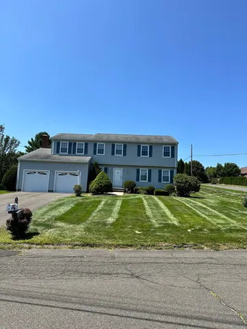 a view of a house with a swimming pool