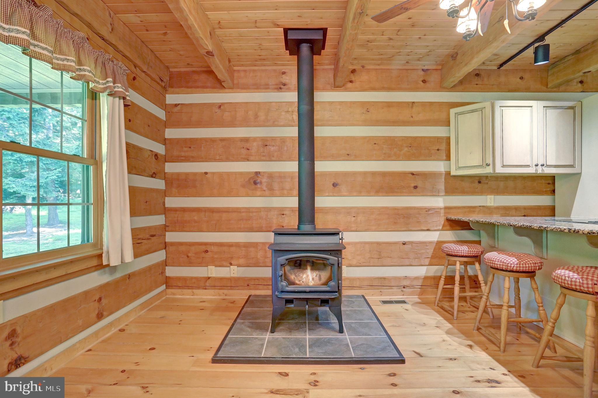 9010 Mountain Road Grantville, PA 17028 - Photo 45 of 61 Added wood stove at end of Dining room