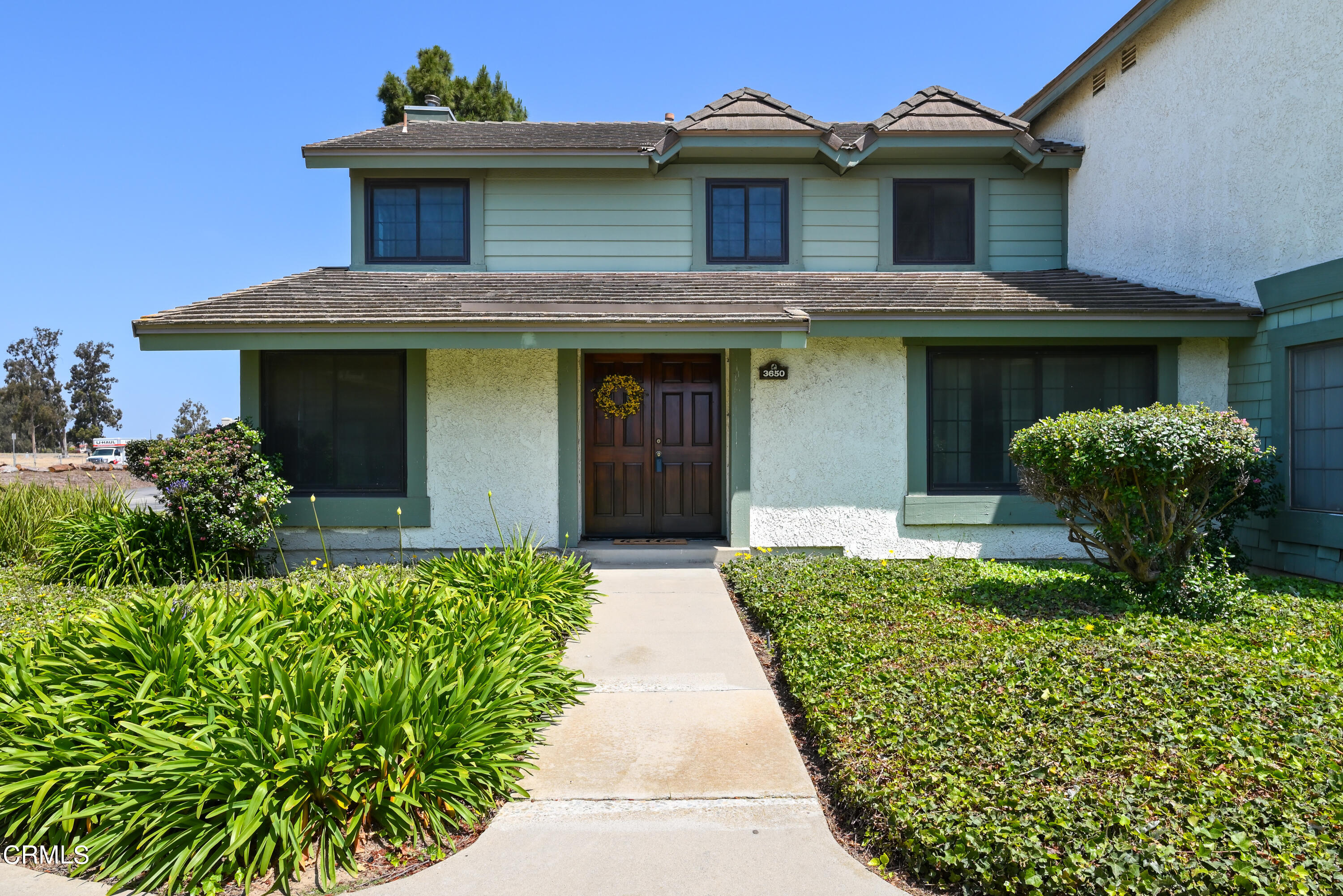 3650 Olds Road Oxnard, CA 93033 - Photo 26 of 27 a view of a house with potted plants