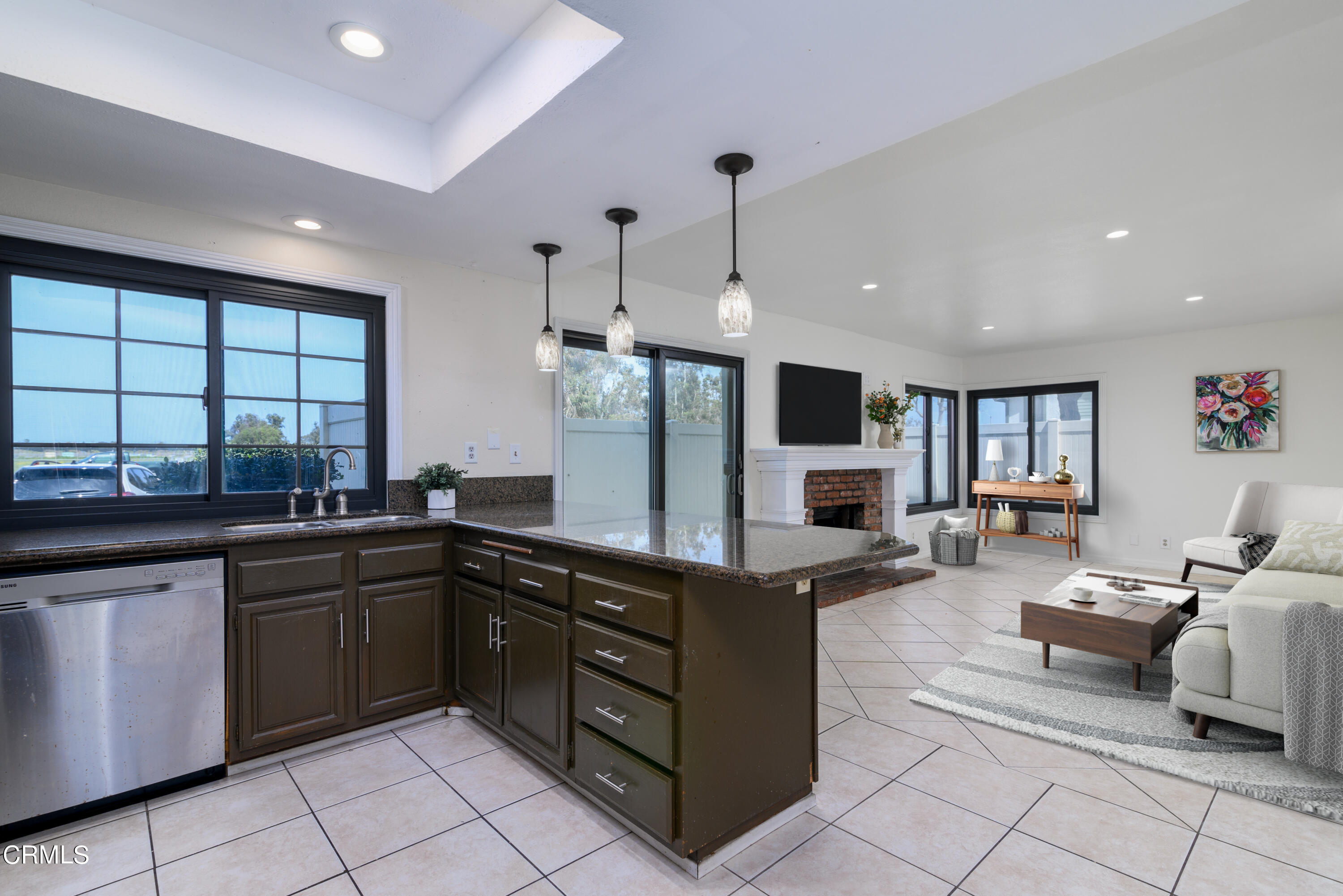 3650 Olds Road Oxnard, CA 93033 - Photo 5 of 27 a kitchen with stainless steel appliances granite countertop sink stove top oven and cabinets