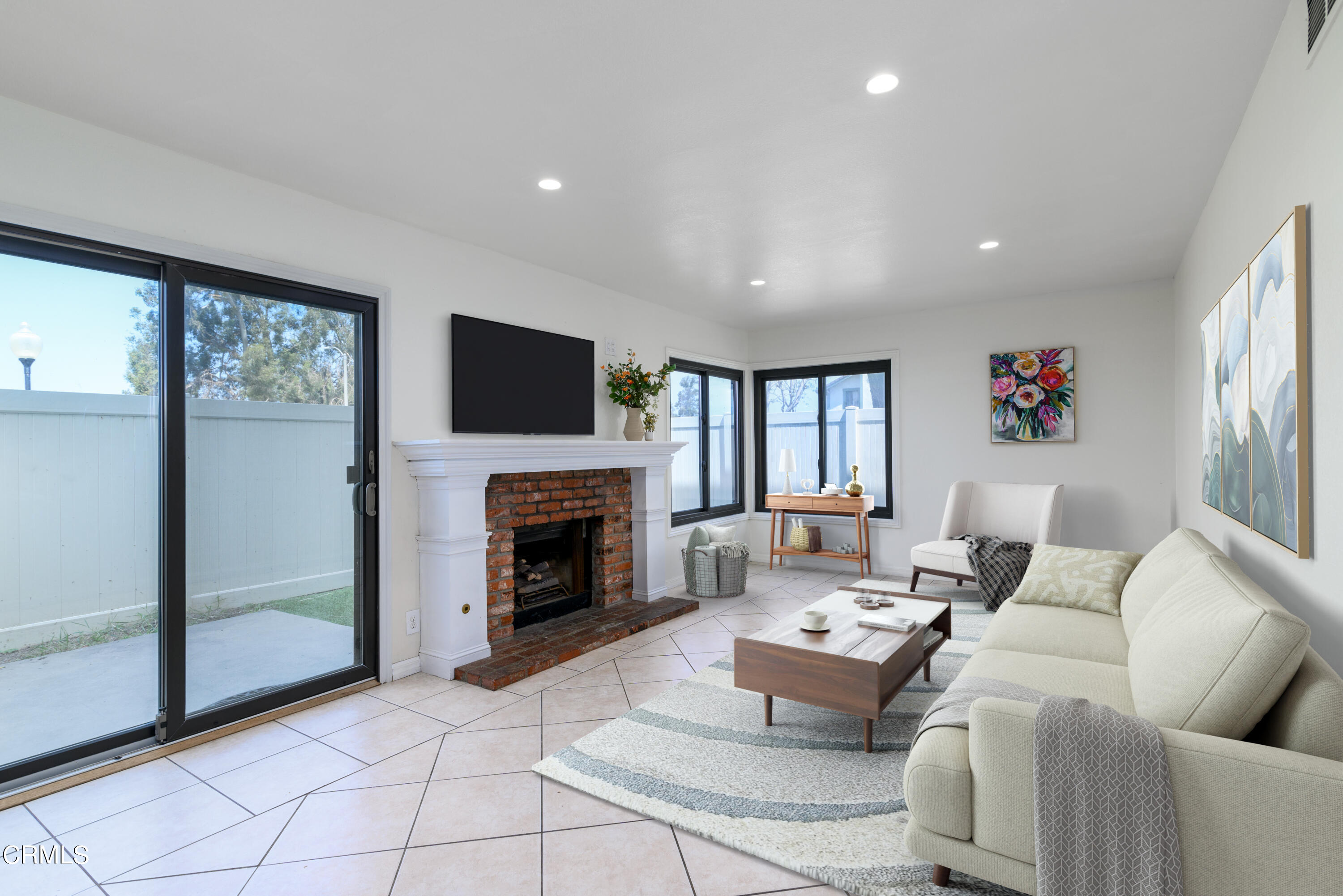 3650 Olds Road Oxnard, CA 93033 - Photo 7 of 27 a living room with furniture and a fireplace