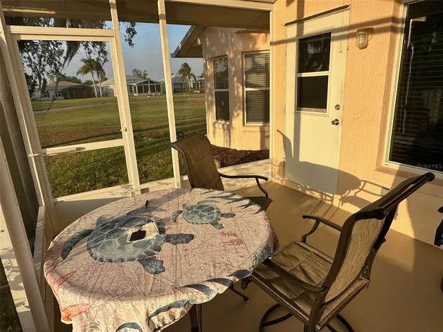 a table with a couch and a table