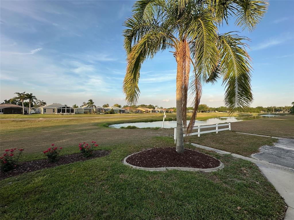 32905 Timberwood Drive Leesburg, FL 34748 - Photo 23 of 27 a view of a lake with a ocean view