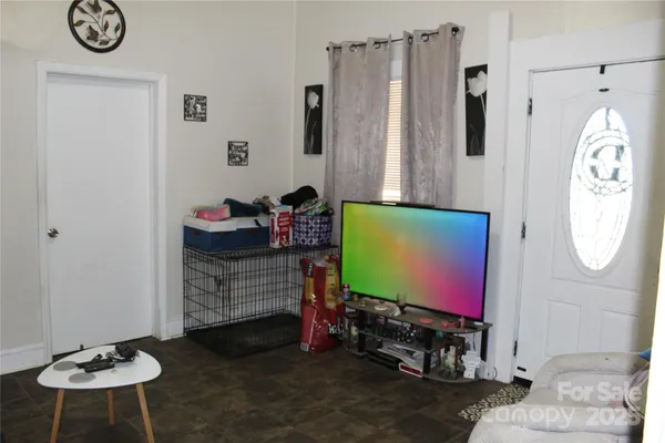 a room with furniture and a mirror