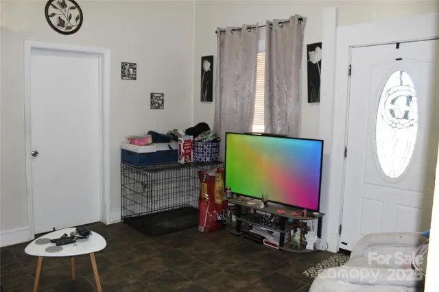 a room with furniture and a mirror