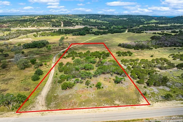 a view of swimming pool from a balcony