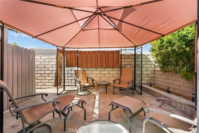 a reading room with furniture and large window