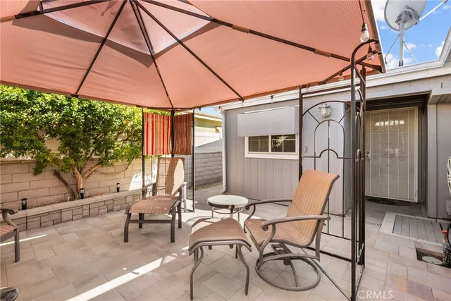 a building outdoor space with patio furniture