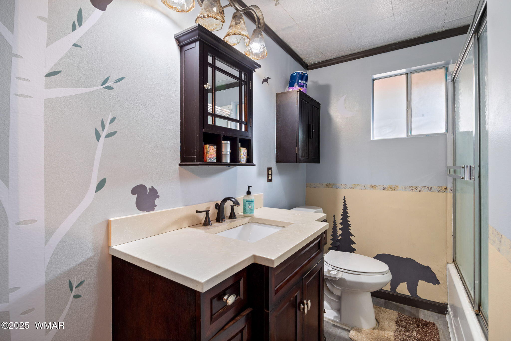 3317 Rim Lakes Drive Overgaard, AZ 85933 - Photo 15 of 33 a bathroom with a sink toilet and shower