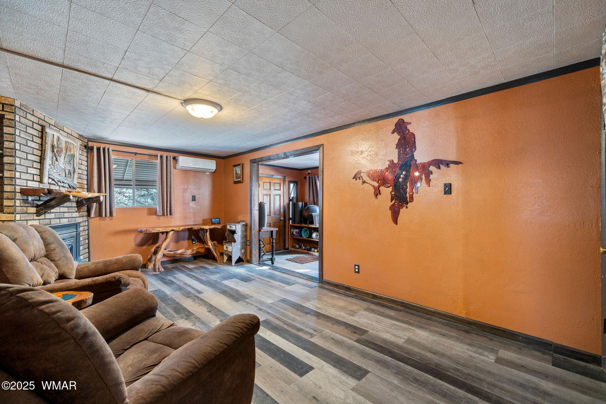 3317 Rim Lakes Drive Overgaard, AZ 85933 - Photo 8 of 33 a living room with furniture and wooden floor